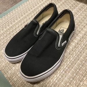 Vans classic black slip-ons